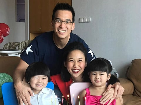 Angelique Widjaja with her husband Andreas Timothy Hadikrisno, and their four-year- old twins: daughter Kelly Grace and son Ashton Gabriel.