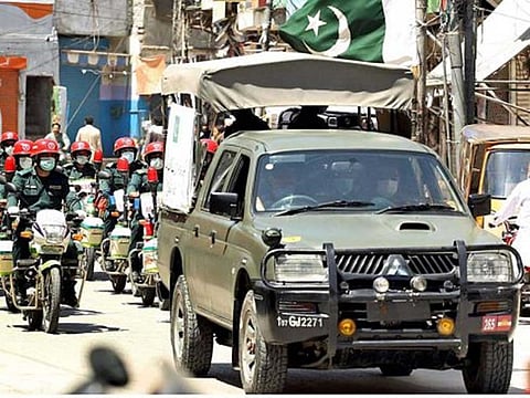 Security officials conducting a flag march on May 15 as Punjab Government ordered to keep the markets closed for three days (Friday, Saturday and Sunday). However, the Supreme Court on Monday has ordered the government to open all the shopping malls seven days a week.