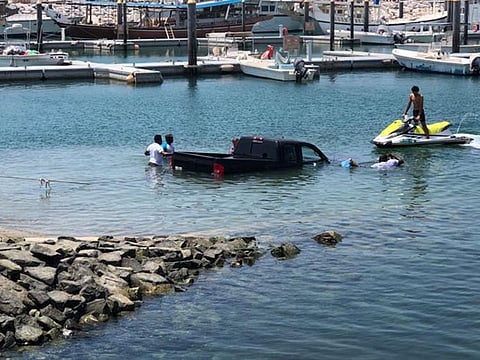A car slid into the sea at Umm Seqeim after its owner tried to launch a jet-ski and lost control 
