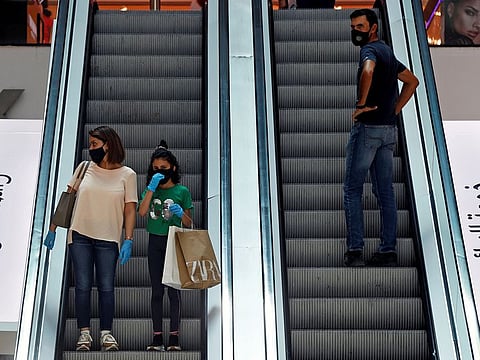 Jordanian people shop in a mall amidst concerns about the spread of the coronavirus disease (COVID-19), in Amman, Jordan 