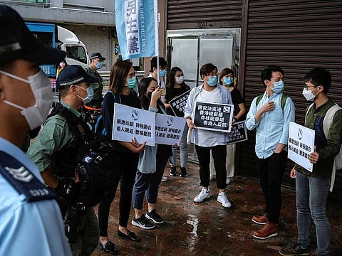 Activists march against new security laws, near China's Liaison Office, in Hong Kong, China May 22, 2020.
