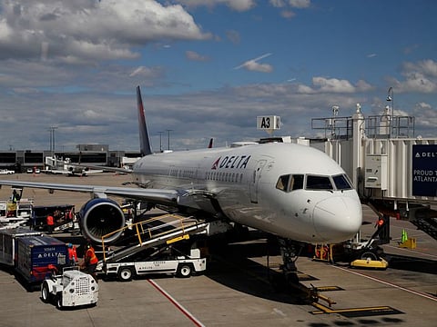 A Delta Airlines plane is parked at a gate as the coronavirus disease (COVID-19) continues. The US Transportation Department accused its counterpart in Beijing of blocking American carriers’ attempts to resume service there.