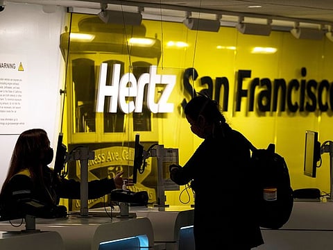 Hertz rental counter at San Francisco International Airport. Hertz was granted permission Friday to sell $1 billion in shares, an extraordinary move after it declared bankruptcy in the United States and Canada.