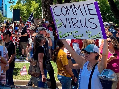 Protesters gathered outside the "Liberty Fest" rally in front of California State Capitol on May 23, 2020, in Sacramento, California, to protest Governor Gavin Newsom's Stay At Home Order to stem the coronavirus outbreak. 