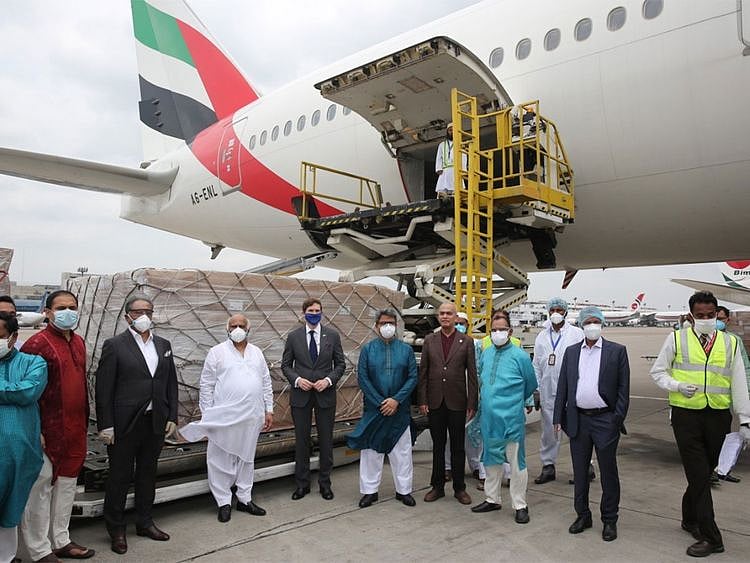 The PPE gowns being loaded on an Emirates flight