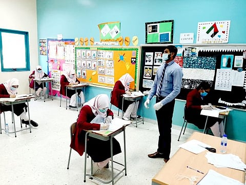 Students of The Model School Abu Dhabi during the exams. While schools across the UAE remain closed, high school students enrolled in the Kerala State Board are back at school premises this week, completing their final board exams.