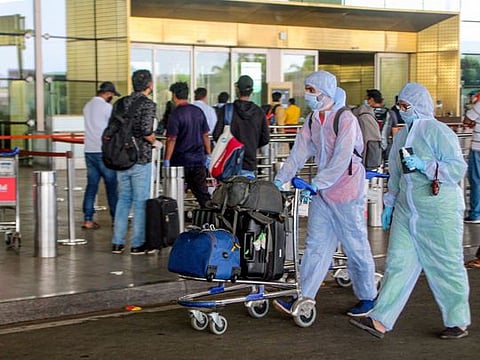 Passengers arrive to take a flight at Chhatrapati Shivaji Maharaj International Airport in Mumbai, as flight restrictions for domestic travel were eased on Monday.