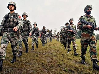 India and China move in extra troops along tense disputed border