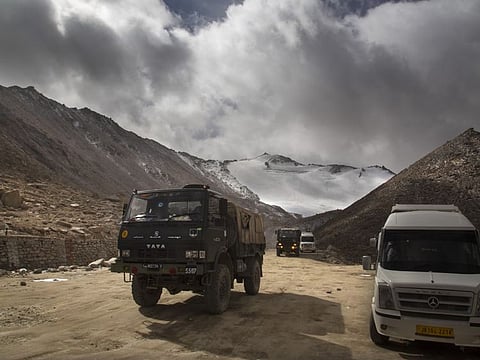 An Indian Army truck crosses the Chang La pass near Pangong Lake in the Ladakh region, close to China. In recent days, both Beijing and New Delhi have increased troop presence along the Line of Actual Control between the nations.