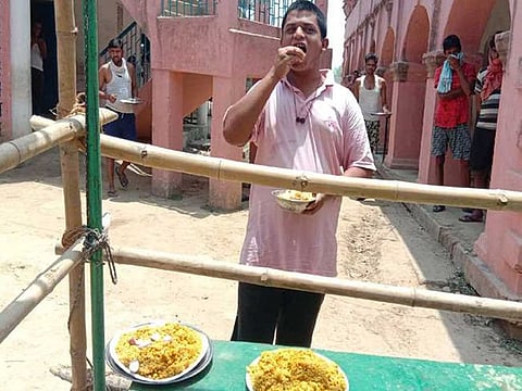 23-year-old Anup Ojha, a migrant, who has returned from Rajasthan, eats 40 rotis and 10 plates of steamed rice daily at a quarantine centre in Buxar. 
