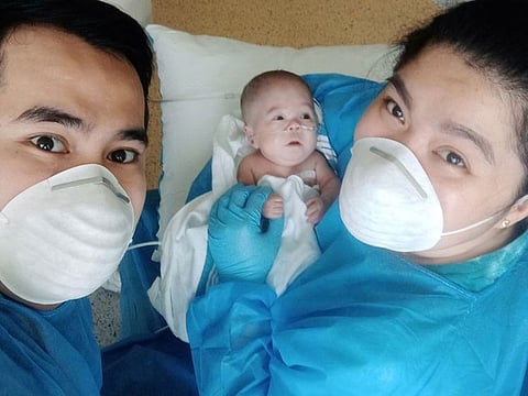 Baby Rain Kristoff with parents 