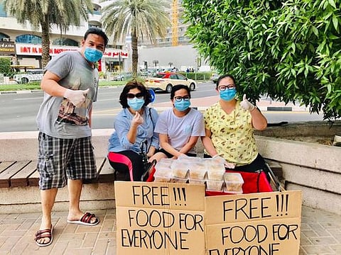 Jobless Filipina hands out free food in Deira during the coronavirus pandemic 