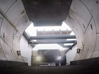 Watch Jay Leno and Elon Musk drive through a tunnel!