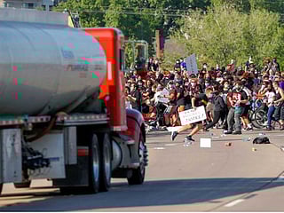 Truck drives into protesters on Minneapolis highway