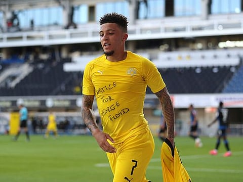 Jadon Sancho shows his message of support for George Floyd after scoring for Borussia Dortmund 