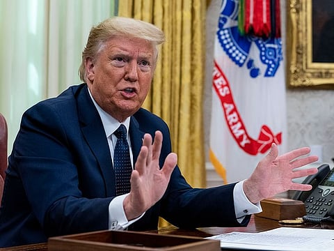 President Donald Trump, speaks before signing an executive order regarding social media, in the Oval Office of the White House in Washington, on Thursday, May 28, 2020.