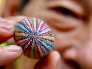 Taiwan's 'Uncle Stone' turns pebbles into colourful keepsakes