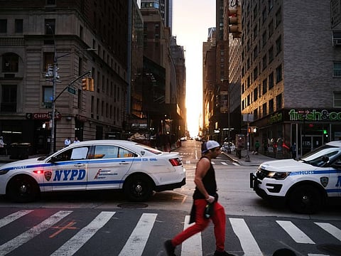 Police enforce an 8pm curfew as thousands of demonstrators again take to the streets of Manhattan to show anger at the police killing of George Floyd on June 02, 2020 in New York City. 