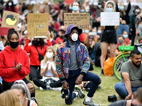 George Floyd killing: Many protestors have resorted to ‘taking a knee’ causing the protest to morph into an act of direct resistance against Trump after the president weighed in on the issue