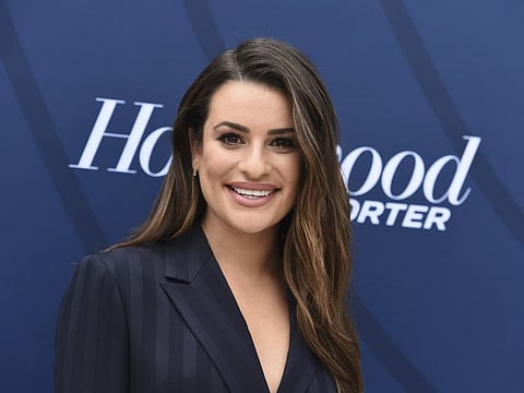 FILE - This April 30, 2019 file photo shows actress Lea Michele at The Hollywood Reporter's Empowerment in Entertainment Gala in Los Angeles. Michele has apologized for being “unnecessarily difficult” on the set of the musical TV show "Glee" after a black co-star accused Michele of making her time there “a living hell.” She issued a statement saying that while she didn't recall any incident or judged anyone by their skin color, she was sorry and blamed “immaturity.”  (Photo by Jordan Strauss/Invision/AP, File)