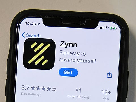 Zynn's interface is a near-clone of TikTok, allowing users to view a continuous feed of short videos featuring other users dancing or performing stunts to upbeat music. But unlike TikTok, Zynn promises more than just entertainment.