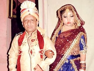 Perfect match: UP bride, groom both 3 feet tall