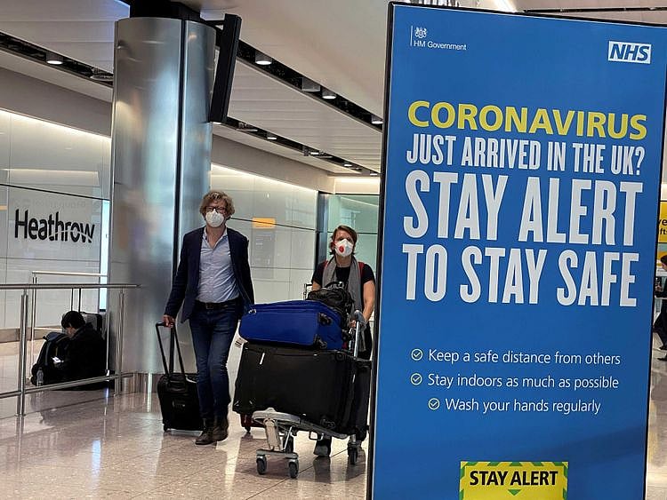 Passengers arrive at Heathrow Airport Britain