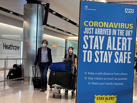 Passengers arrive at Heathrow Airport, as Britain launches its 14-day quarantine for international arrivals, following the outbreak of the coronavirus disease (COVID-19), London, Britain, June 8, 2020. 