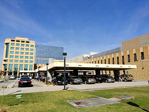 The Medical Supporting Services Building and parking lot of the King Faisal Specialist Hospital and Research Centre.