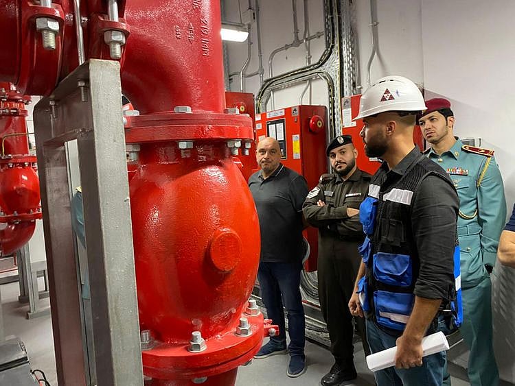 Civil Defence officials inspecting the fires safety measures at a building 