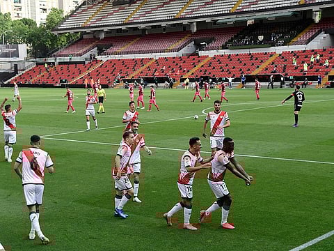 Rayo's Peruvian defender Advincula celebrates his goal with teammates during the match against Albacete at the Vallecas stadium in Madrid.
