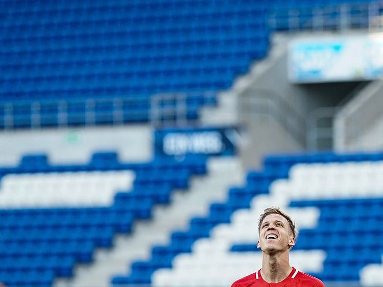Leipzig's Dani Olmo celebrates after scoring his side's second goal against Hoffenheim.