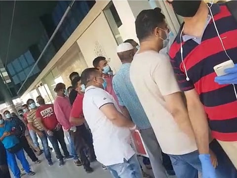 Huge crowds throng the BLS International office in Deira