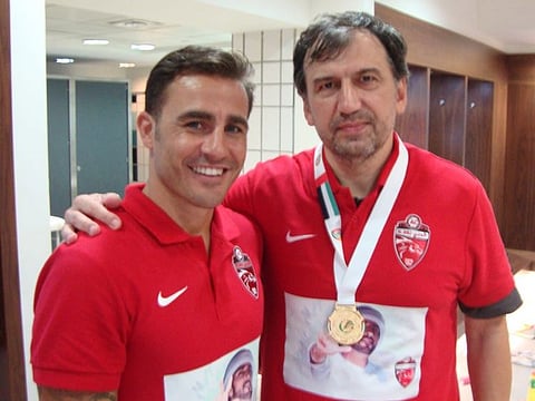Faiq Huseynov with Fabio Cannavaro during his time at Al Ahil