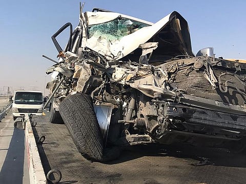 A Dubai pick-up driver’s negligence has caused serious injuries to an Emirati, after he left his vehicle in the middle of the highway to speak to a fellow motorist