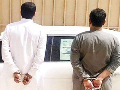 Saudi men caught impersonating police officers