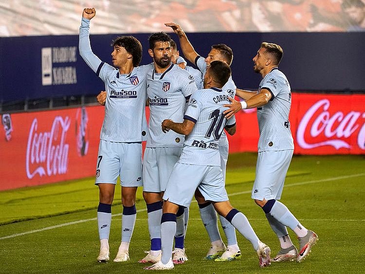  Atletico Madrid's Joao Felix celebrates scoring their first goal with Diego Costa and teammates