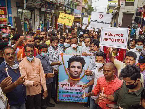 Fans of Bollywood actor Sushant Singh Rajput participate in a candlelight march as they protest against alleged nepotism in Bollywood in Patna.
