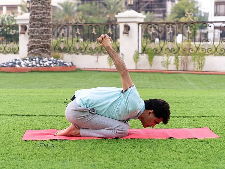 Anis Sajan in a yoga pose 