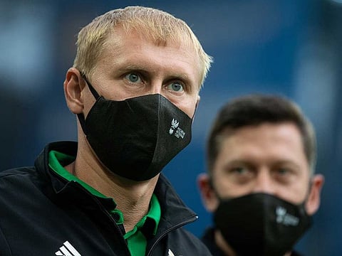 Referee Sergei Ivanov wearing a mask before the match, as play resumes in the Russian Premier League football following the outbreak of the coronavirus disease (COVID-19), Soccer Football - Russian Premier League Moscow, Russia, on June 20, 2020. 