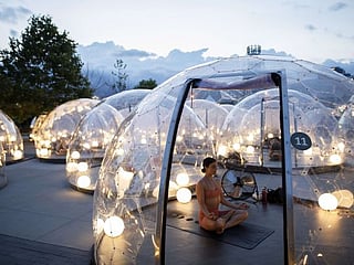 COVID-19 impact: Outdoor yoga in bubble pods in Canada