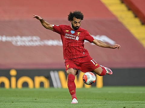 Liverpool's Mohamed Salah scores the second goal.