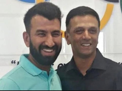 Cheteshwar Pujara (left) had been left with the responsibility of being compared his idol Rahul Dravid throughout his career. 