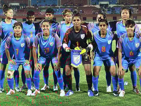 Aditi Chauhan, captain and goalkeeper of Indian women's football team (centre), is happy that competition for places in the national team has grown now.