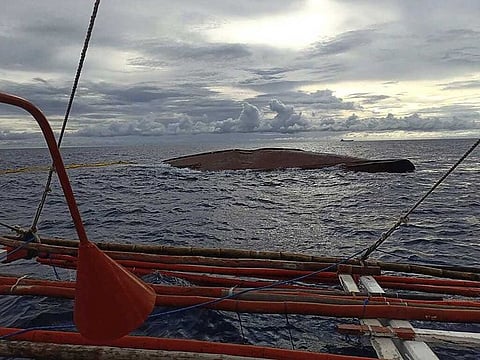 The remains of the FV Liberty 5 along the waters off Mamburao town in Mindoro Occidental province.