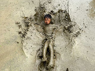 Farmers celebrate National Paddy Day in Nepal as the annual rice planting season begins