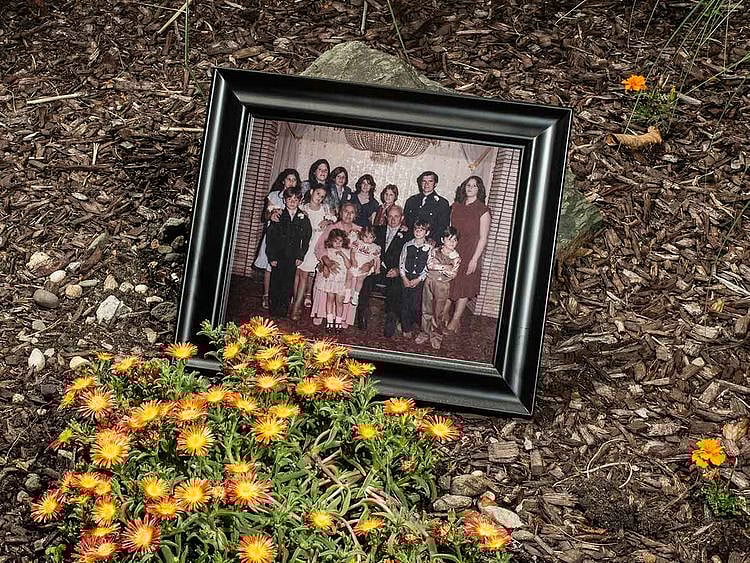 A photograph of the Fusco children and their parents, Grace and Vincenzo, from 1980, is displayed in Freehold, N.J., on June 9, 2020. The Fusco family lost five relatives to the coronavirus.