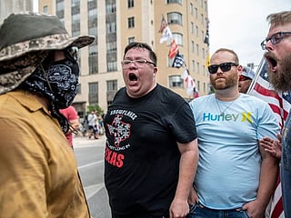 In pictures: American's protest COVID-19 restrictions despite rise in number of cases  
