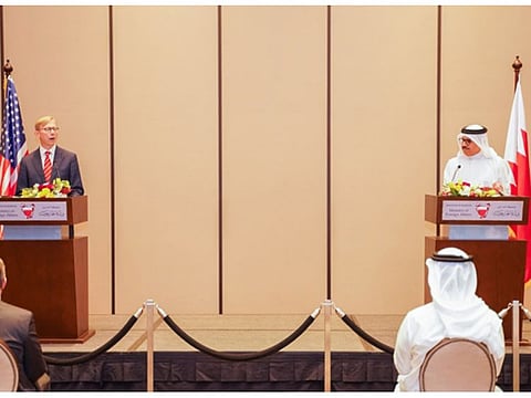 Brian Hook (left) and Bahraini Foreign Minister Al Zayani at a press conference in Manama. 