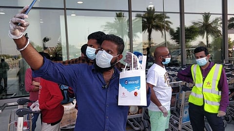 A passenger on the free charter flight by Kairali TV takes a selfie before departure from Dubai to Kochi on Monday.
Supplied